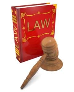 code of laws and gavel are on white background.