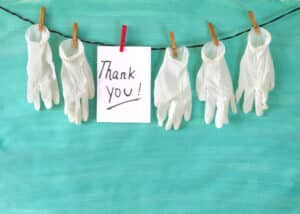 medical gloves and the message Thank you