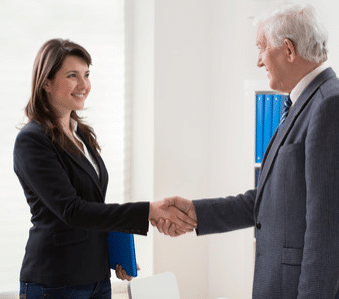 A man and a woman shaking hands