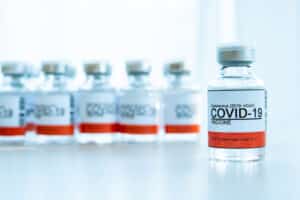Coronavirus - 2019-nCoV or COVID-19 vaccine bottles for injection use only. Urgent vaccine research and production use in COVID-19 - Coronavirus disease. COVID-19 vaccine close up with copyspace.
